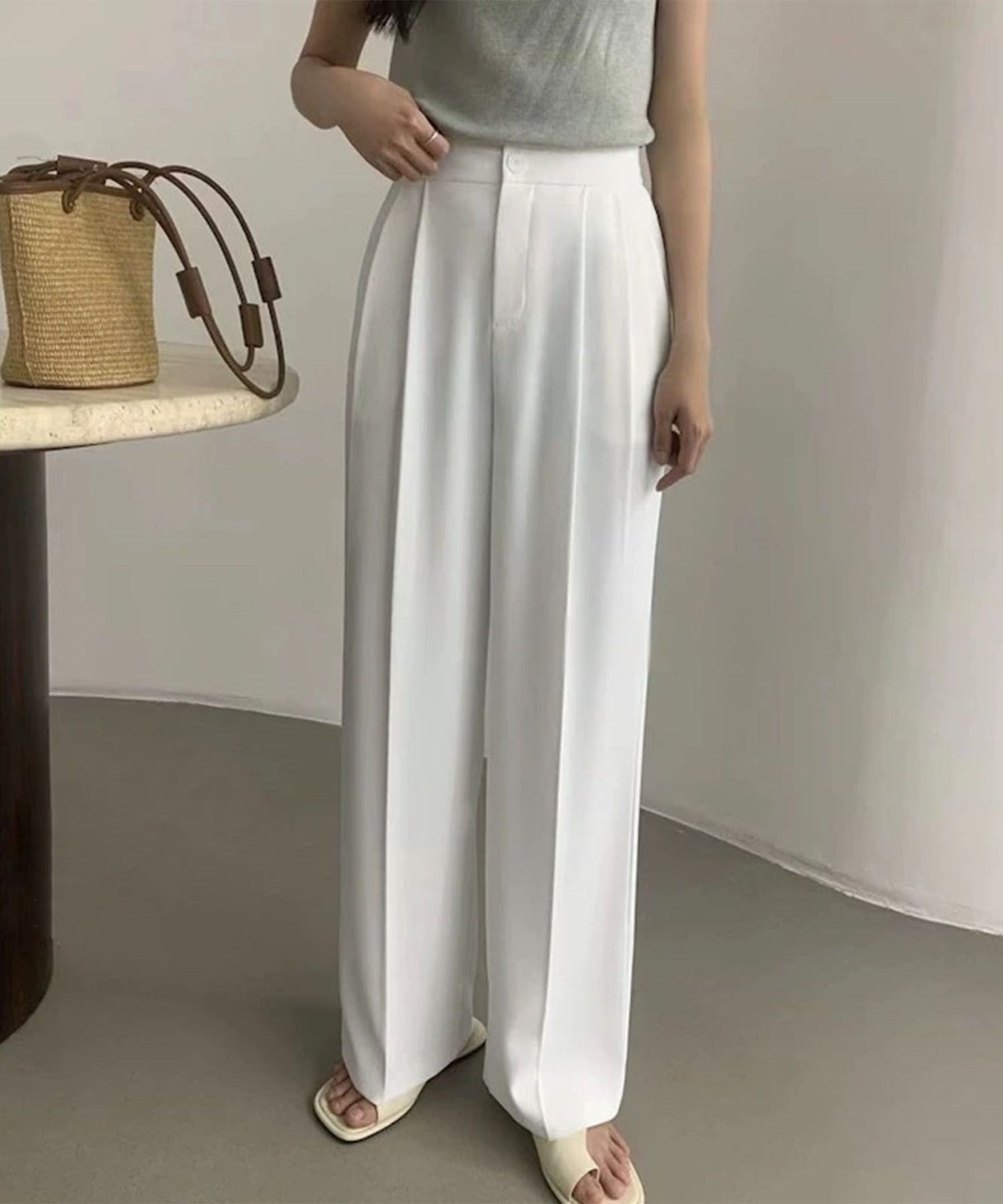 High-waisted pleated straight-leg trousers