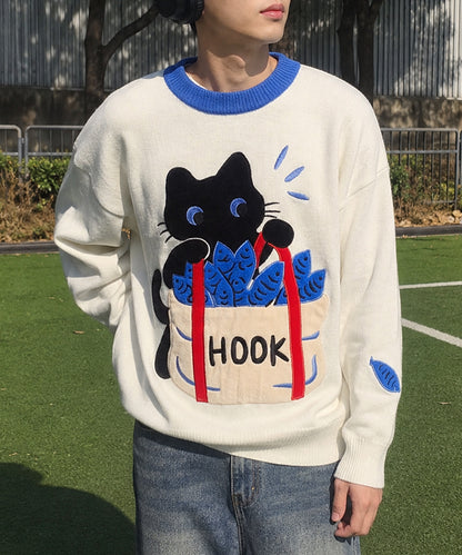 HOOK -original-　「あれ？魚1本足りない」パッチワークニットプルオーバー