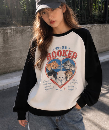 HOOK -original-　ハート猫プリントラグランスウェットプルオーバー