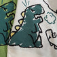 【HOOK】かわいい落書き恐竜イラスト 総柄ニット